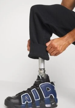 YOURTURN Unisex - Trainingsbroek - Black -Kledingwinkel 96890d6b49c24a0ca097867b183abe35