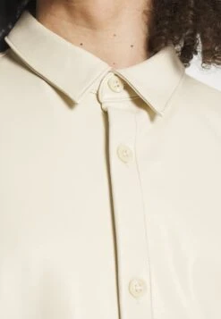 YOURTURN Unisex - Imitatieleren Jas - Beige -Kledingwinkel a32ba3b97fb84e7fae95b9c061124838