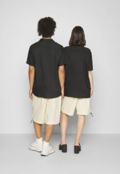 YOURTURN Genderless Parachute - Shorts - White 9 YOURTURN Genderless Parachute - Shorts - White -Kledingwinkel ad64c955882844c7b90940b0d39e59fc