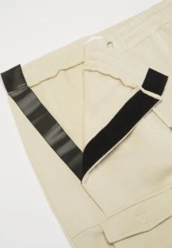 YOURTURN Trainingsbroek - Beige -Kledingwinkel d9756528a5f046829b9e56dbebee00ba