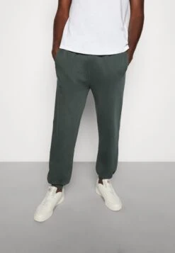 YOURTURN Oversized Unisex - Trainingsbroek -Dark Green -Kledingwinkel e034143c08c84d0d8184e89ab87f6ca8